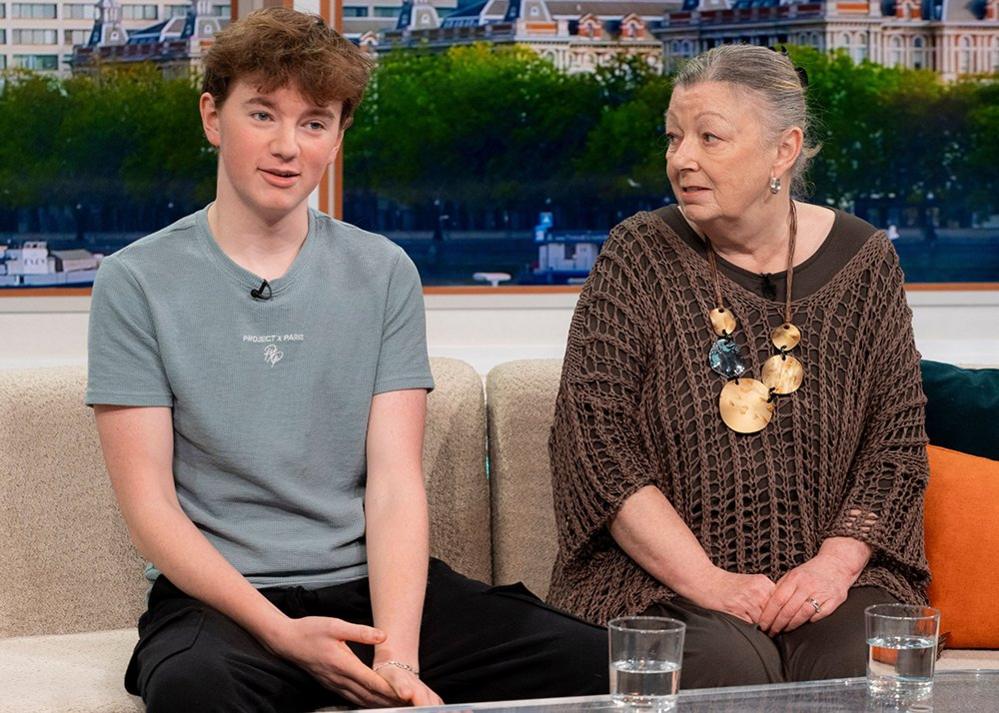 Alex Batty and his grandmother Susan Caruana sit on a sofa while talking during an interview for Good Morning Britain