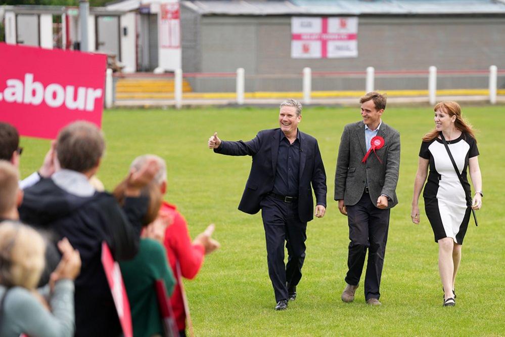 Newly elected Labour MP Keir Mather (centre), with Labour leader Sir Keir Starmer and deputy Labour Party leader Angela Rayner at Selby football club