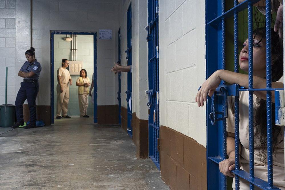 A female inmate looks out of her cell at the Ilopango Women's Prison, El Salvador. November 6, 2018.