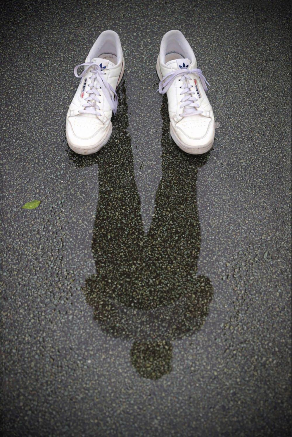 Reflected figure with shoes