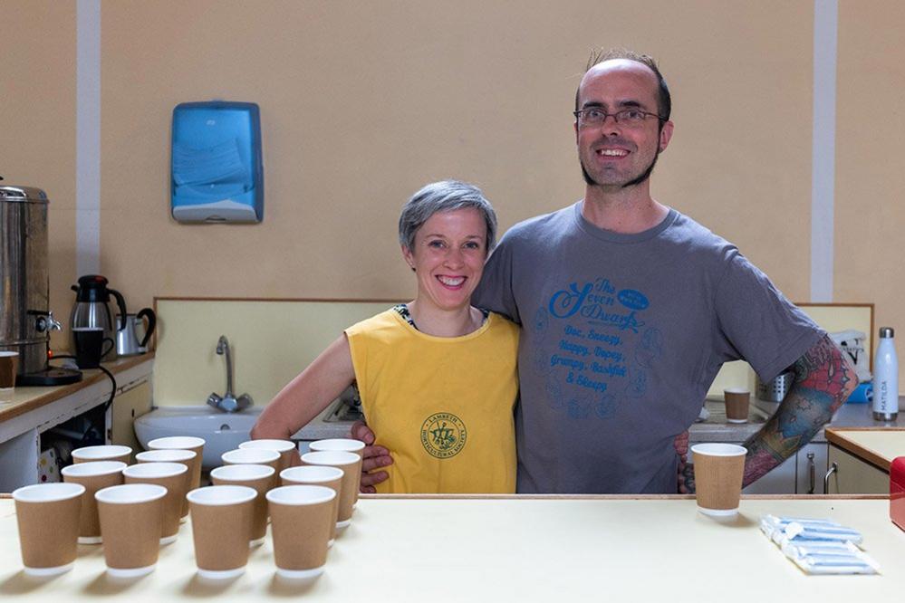 Matilda Smith and Sam Harris serving tea