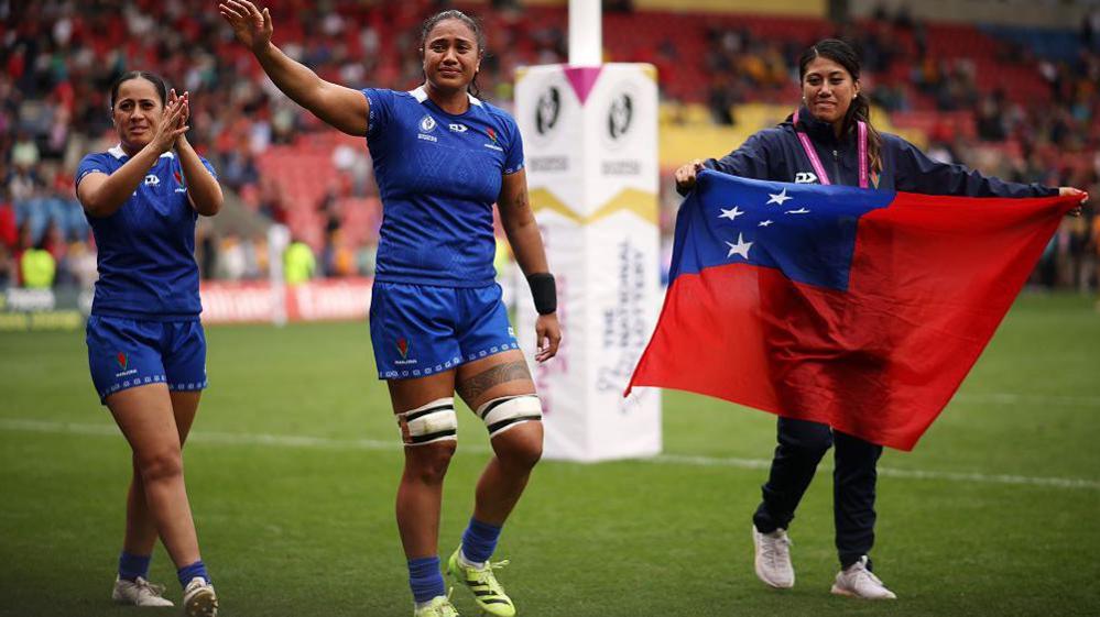 Samoa players thank their supporters after their match against Australia