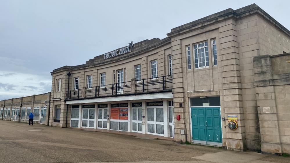 The front of the Tropicana building showing the original 1930s facade.