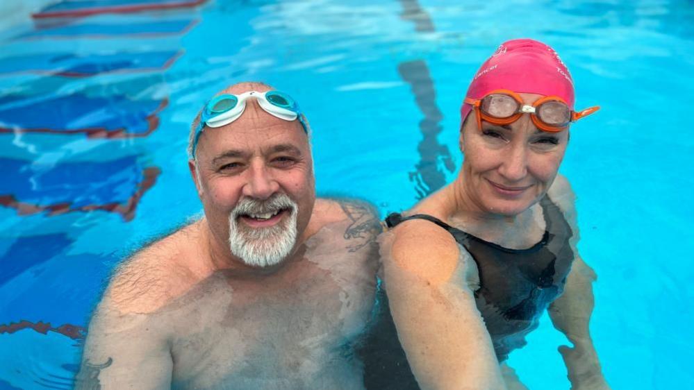 Phil and Sonia Hayden in Peterborough Lido smiling