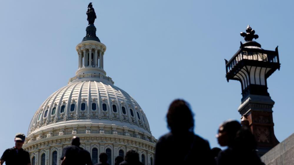 Members of the public walk past the US Capitol in Washington, DC, USA, 04 June 2026