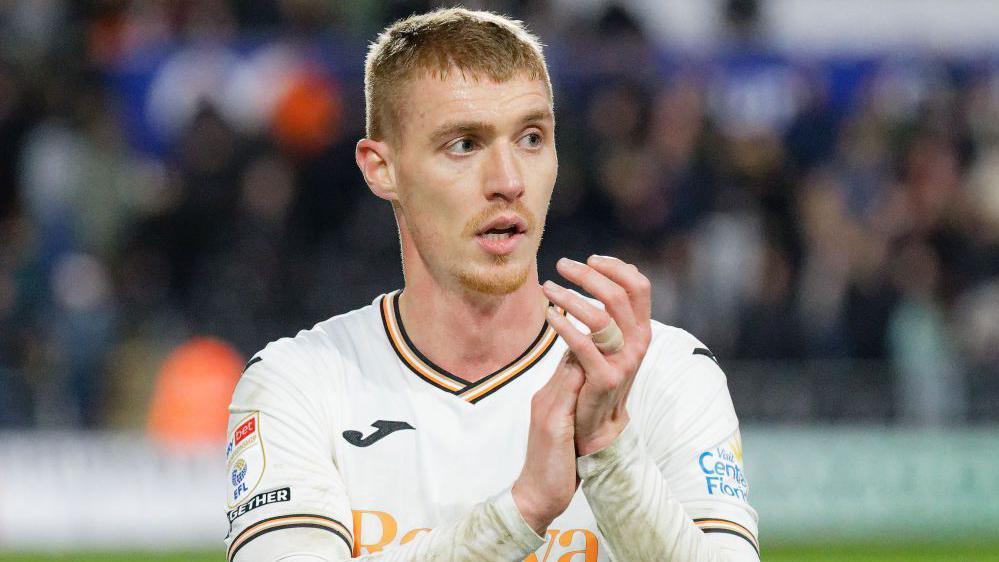 Jay Fulton applauds Swansea fans