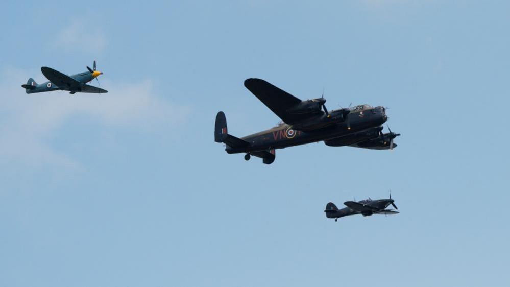 Flypast by World War Two-era aircraft the Spitfire, Hurricane and Lancaster bomber