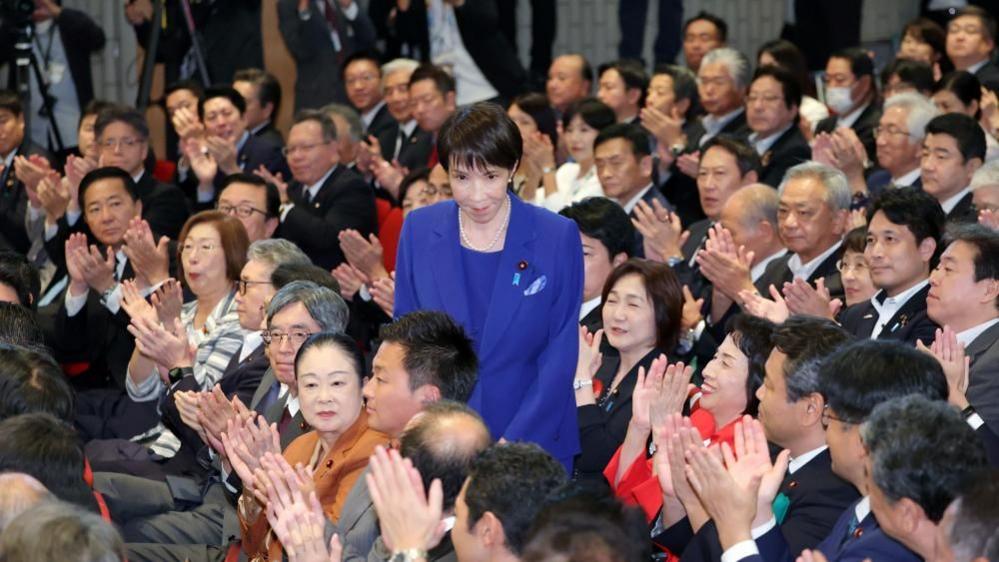 Sanae Takaichi receives an applause after winning the LDP leadership election in Tokyo.