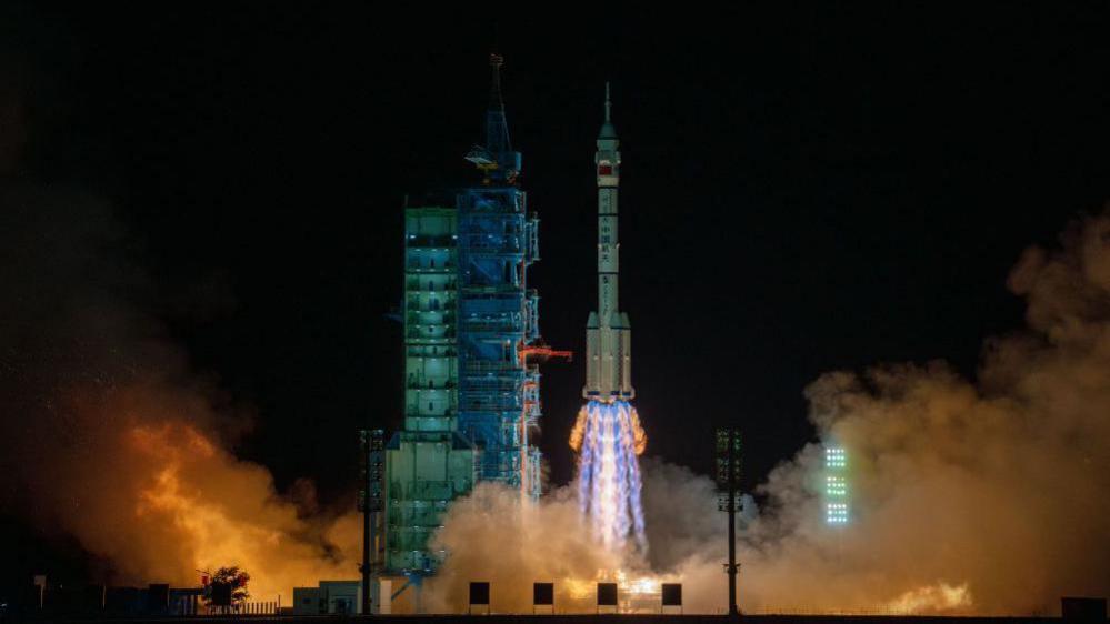 The Shenzhou-19 crewed spaceship, atop a Long March-2F carrier rocket, blasts off from the Jiuquan Satellite Launch