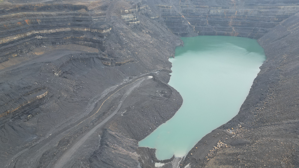 Drone image of water collecting in Ffos-y-Fran mine