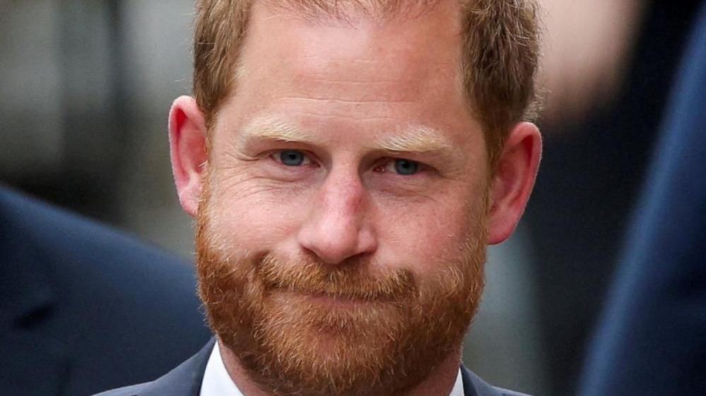 Headshot of Prince Harry walking to court in London in April 2025.