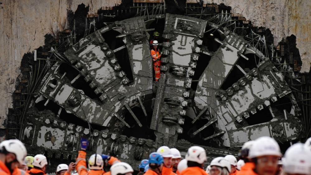 Members of the Tunnel Boring Team look out after digging machine Florence completed HS2's longest tunnel