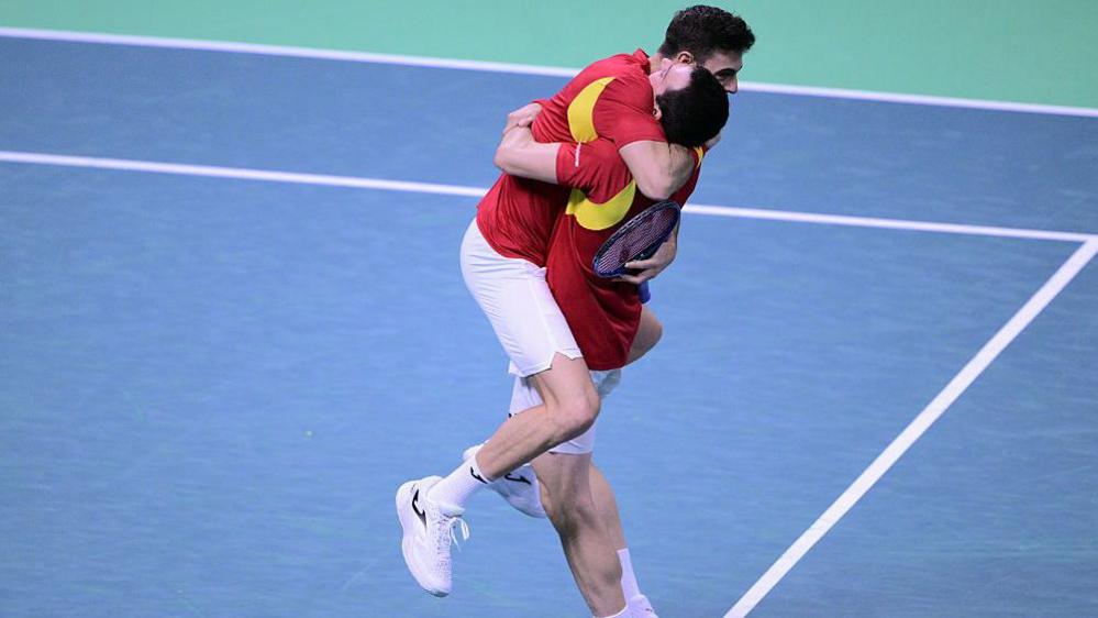 Marcel Granollers and Pedro Martinez hug aft winning their doubles match