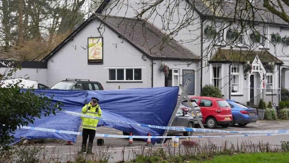 A crime scene outside a pub