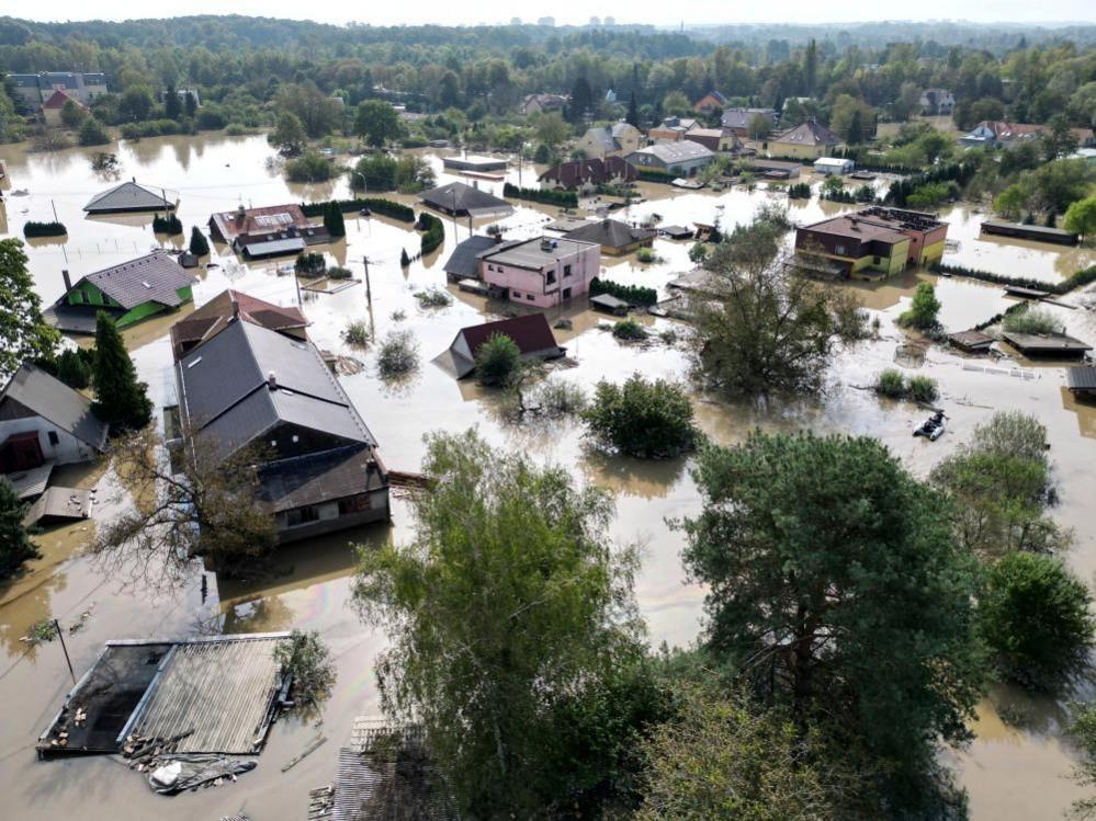 A drone view shows the flood-affected area in Ostrava, many houses are submerged entirely or up to the second floor