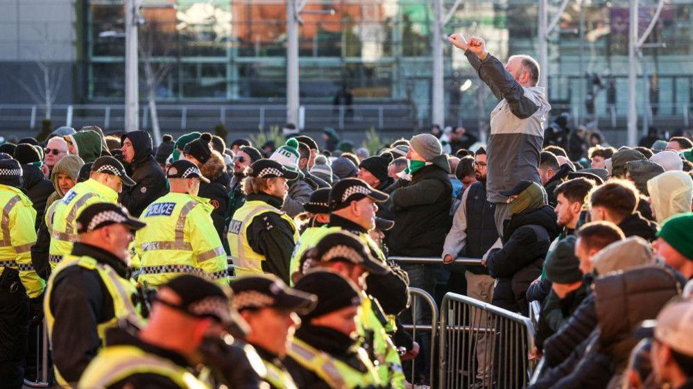 Disgruntled Celtic fans gather outside the stadium post-match to protest against the club's board