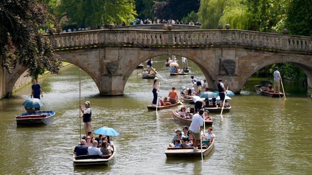 Punts near a bridge on the River Cam