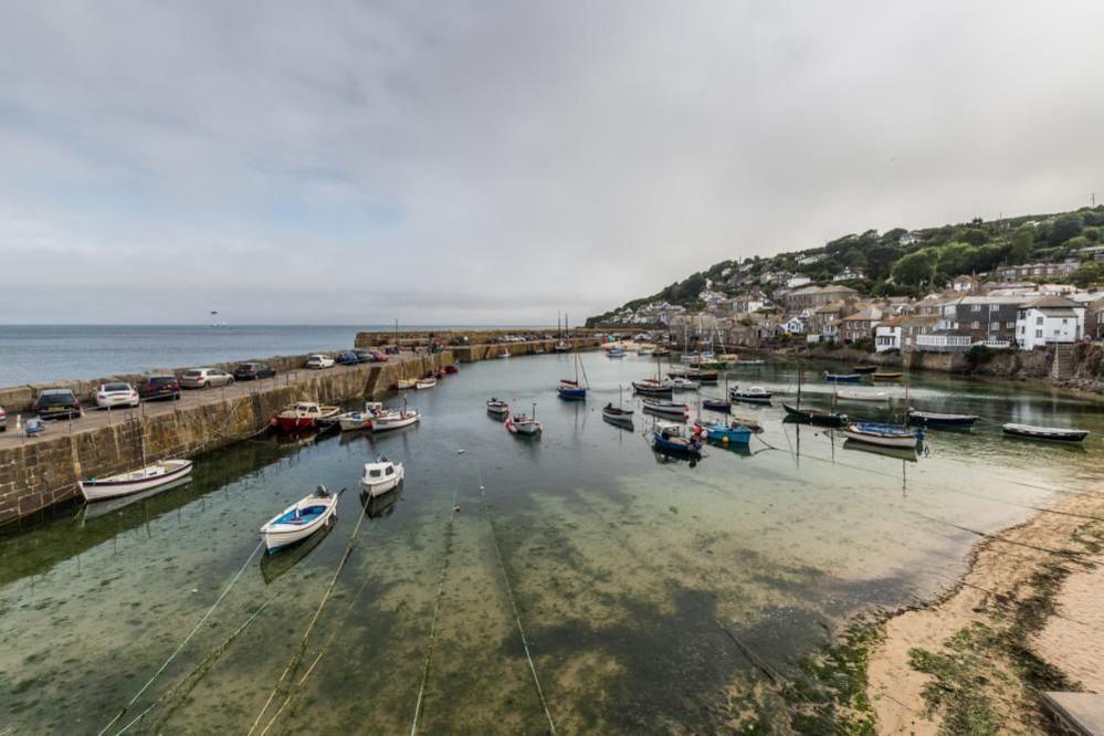 A view over the harbour in the village of Mousehole, Cornwall