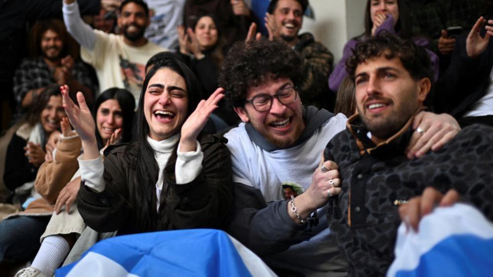 Image shows family members and supporters of Omer Wenkert reacting to his release on 22 February, 2025. Mr Wenkert had been held in Gaza as a hostage since October 7, 2023