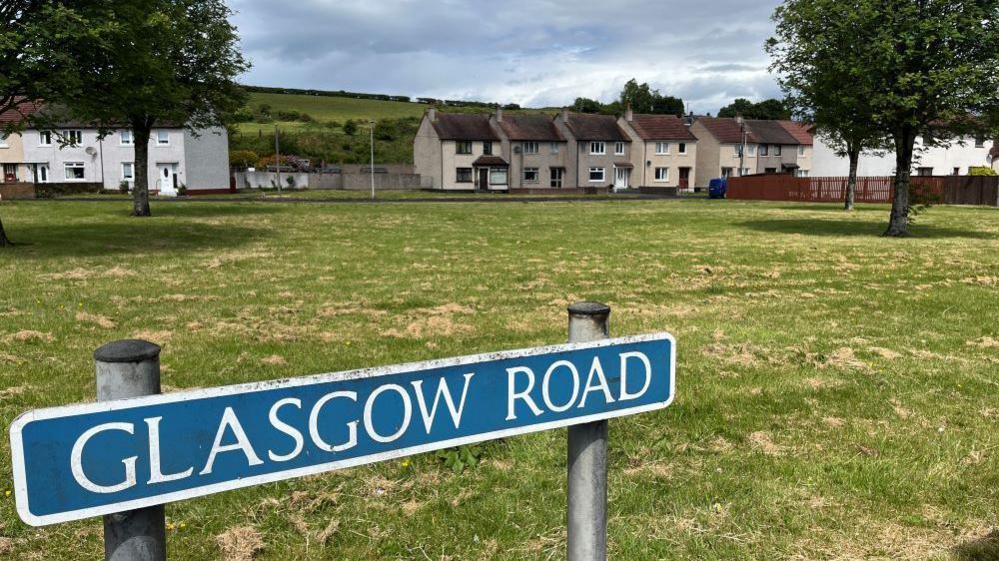 A blue street sign which says Glasgow Road, one of the last known locations of missing teenager Cole Cooper.