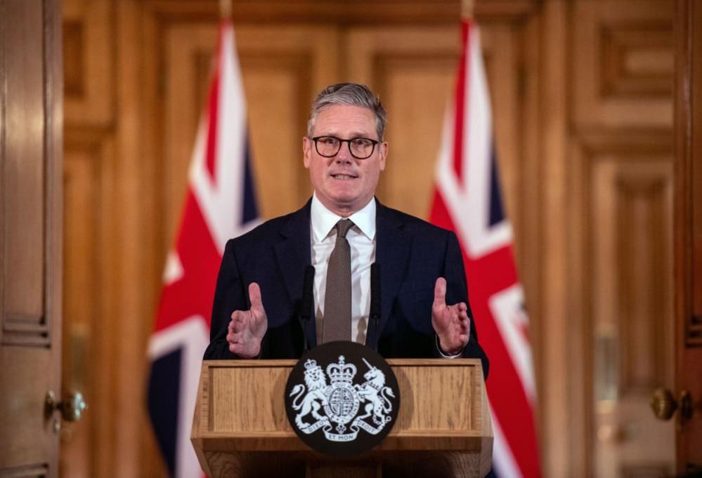 Keir Starmer speaks during a news conference following his first cabinet meeting, at Downing Street 