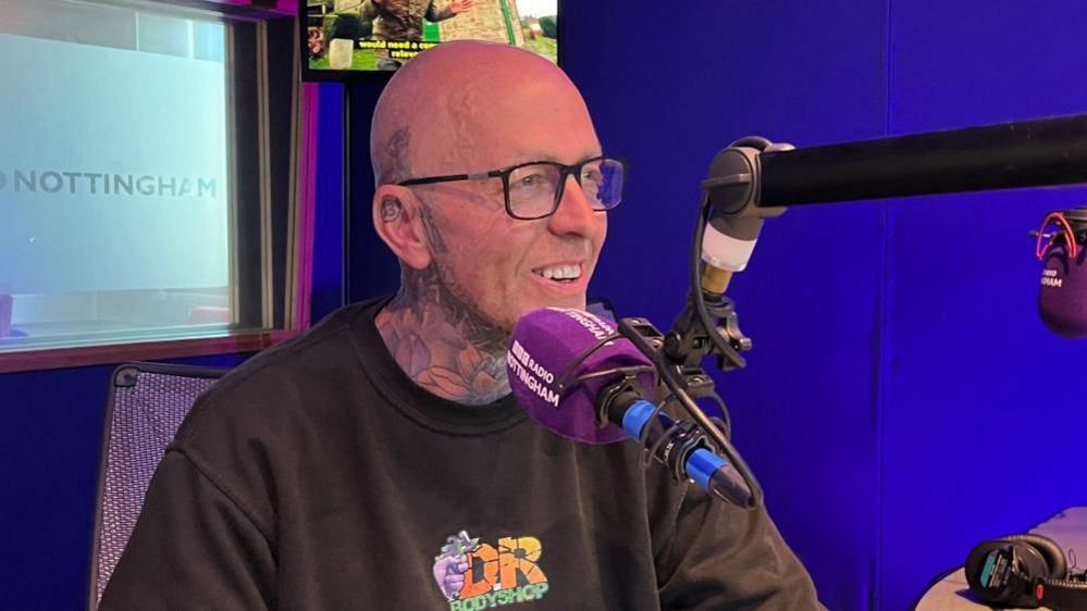 Daniel Nowell in the studio of BBC Radio Nottingham.
