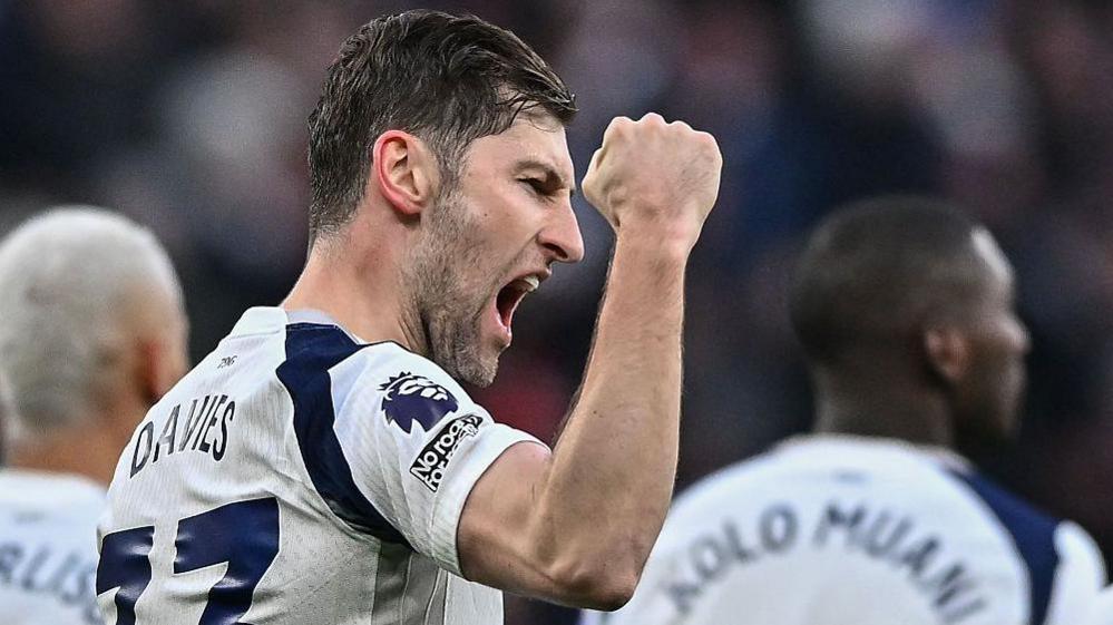 Ben Davies celebrates with a clenched fist after giving Spurs hope of a rare home win by putting them in front against Sunderland