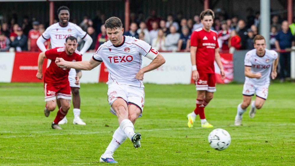 Kevin Nisbet scores penalty at Brora