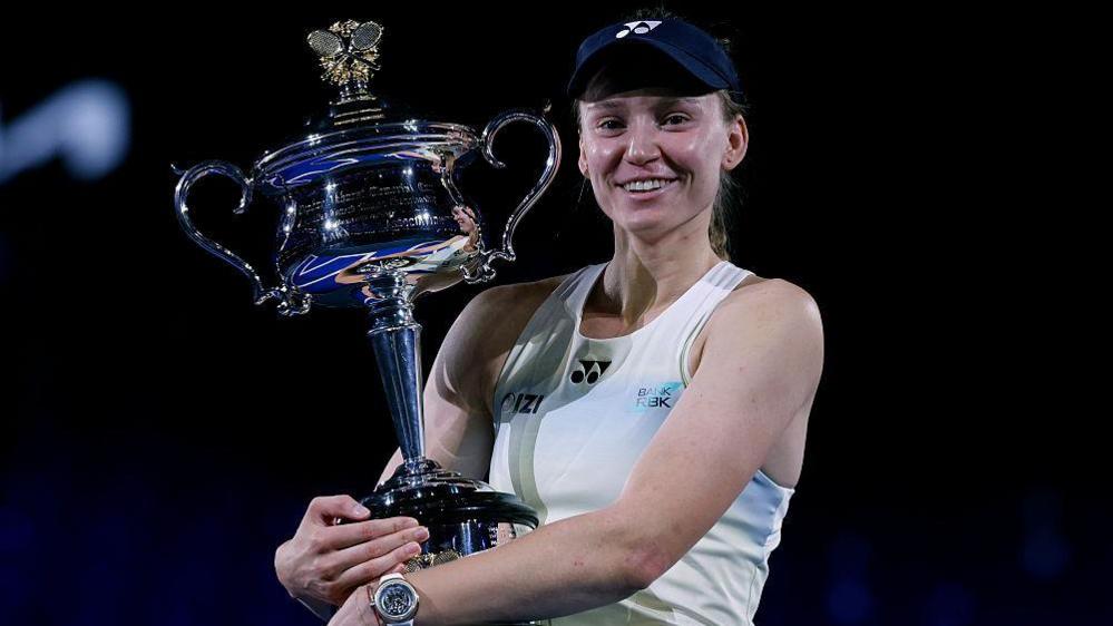Elena Rybakina with her trophy