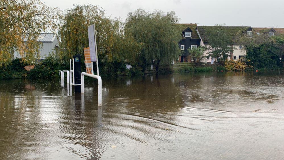 Flooding at a car park in Potter Heigham