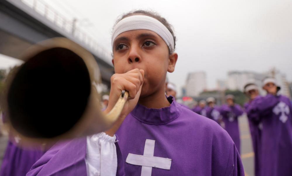 Ethiopian Orthodox choir member blows a traditional trumpet during the Meskel festival, a celebration to commemorate the discovery of the True Cross on which Jesus Christ was crucified, in Addis Ababa, Ethiopia, September 26, 2024