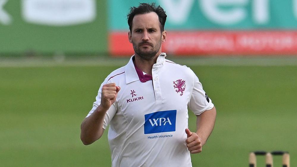 Somerset captain Lewis Gregory celebrates taking a wicket against Nottinghamshire at Trent Bridge by punching his right fist in the air