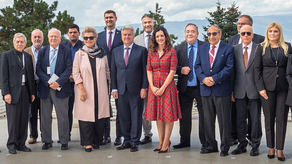 Salmond pictured at the conference on Friday alongside Alba chair Tasmina Ahmed-Sheikh