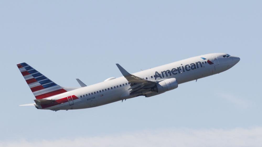 An American Airlines Boeing 737-823 airborne as it departs from Boston Logan International Airport in East Boston, Massachusetts