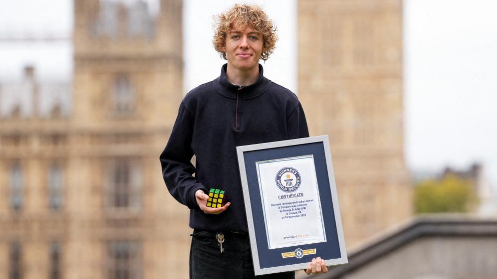 George Scholey with world record certificate