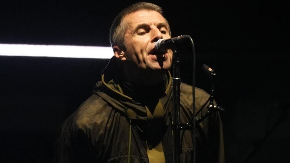 Liam Gallagher as Oasis takes to the stage at the Principality Stadium, Cardiff