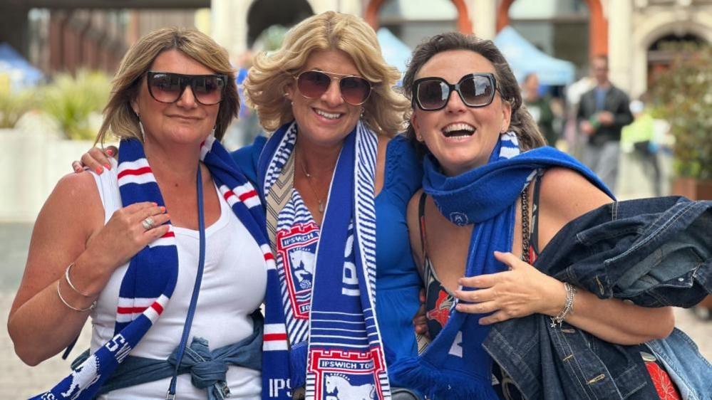 Three women Ipswich Town football fans 