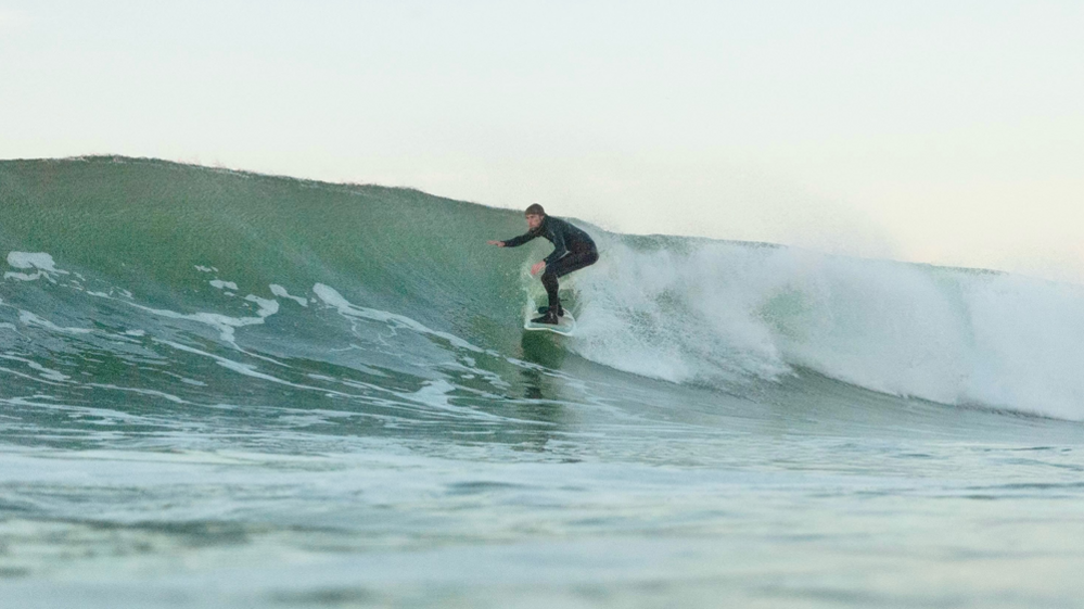 Daniel McAleese surfing