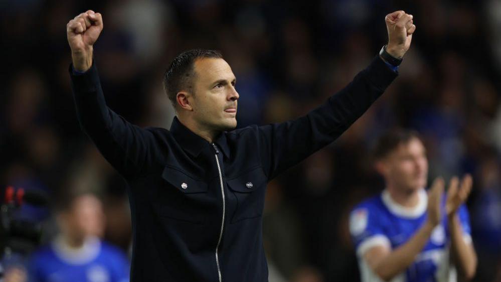 Birmingham City manager Chris Davies celebrates with arms aloft