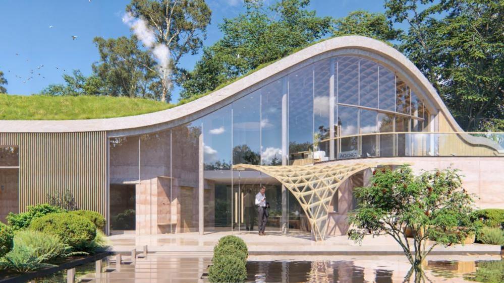 An artist's impression of a house partially buried into the topography of the landscape, with a glazed and timber clad frontage with a latticework cover over the front entrance, a lake in the foreground, and trees behind.