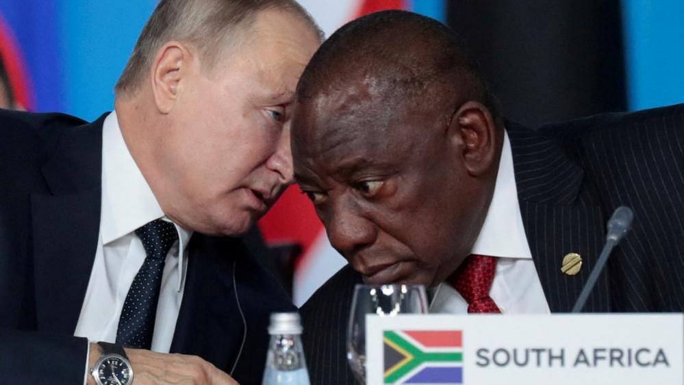 Russia's President Vladimir Putin speaks with South African President Cyril Ramaphosa at the first plenary session as part of the 2019 Russia-Africa Summit at the Sirius Park of Science and Art in Sochi, Russia, October 24, 2019