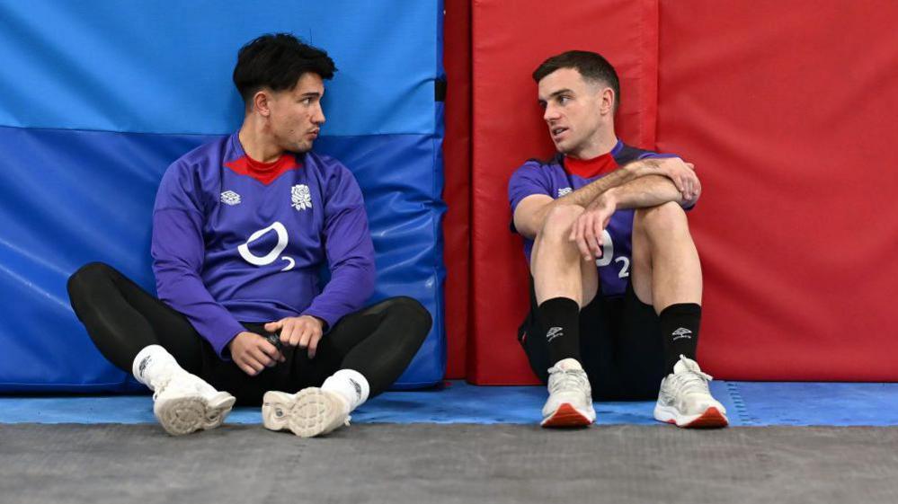 Marcus Smith and George Ford chat after training