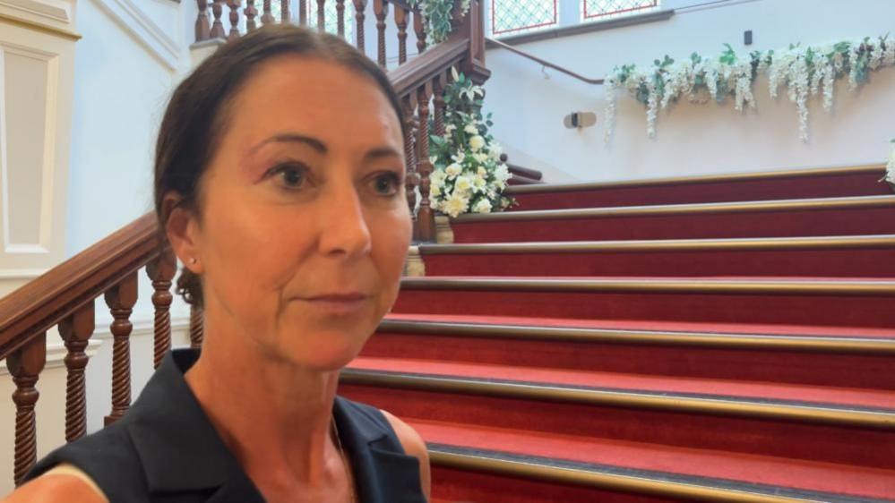 Sheila Oxtoby by the staircase at Great Yarmouth town Hall