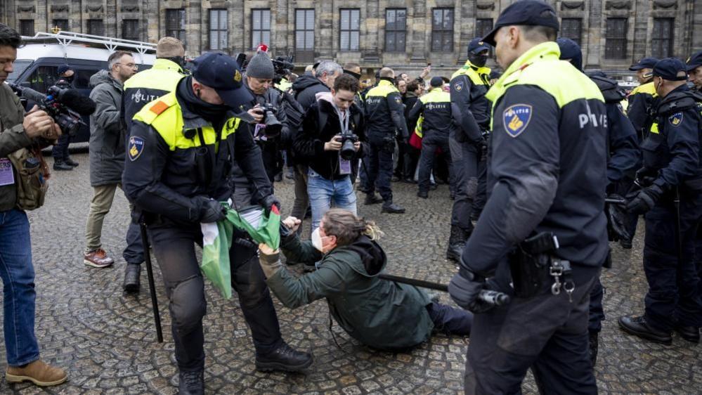 Dutch police detain pro-Palestinian protesters on Dam Square in Amsterdam, the Netherlands, 10 November 2024