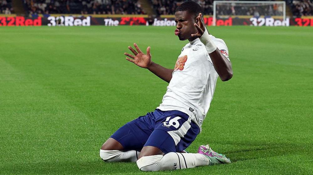 Thierry Small celebrates with a knee slide after scoring for Preston North End against his old club Charlton Athletic