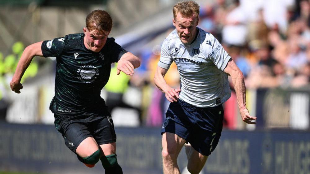 St Johnstone's Fran Franczak and Dundee's Scott Tiffoney in action