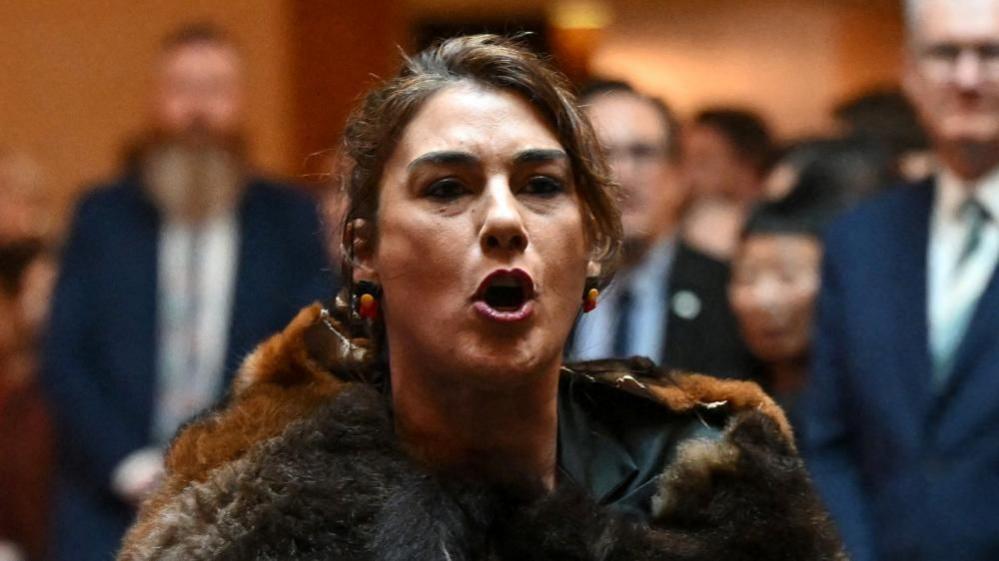 King Charles is heckled by Australian politician Senator Lidia Thorpe before she was escorted away by security at the Australian Parliament House for Ceremonial Welcome and Parliamentary Reception, Canberra, Australia October 21, 2024