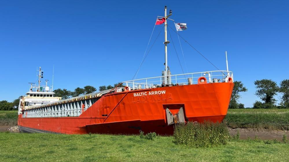 Ship wedged in river