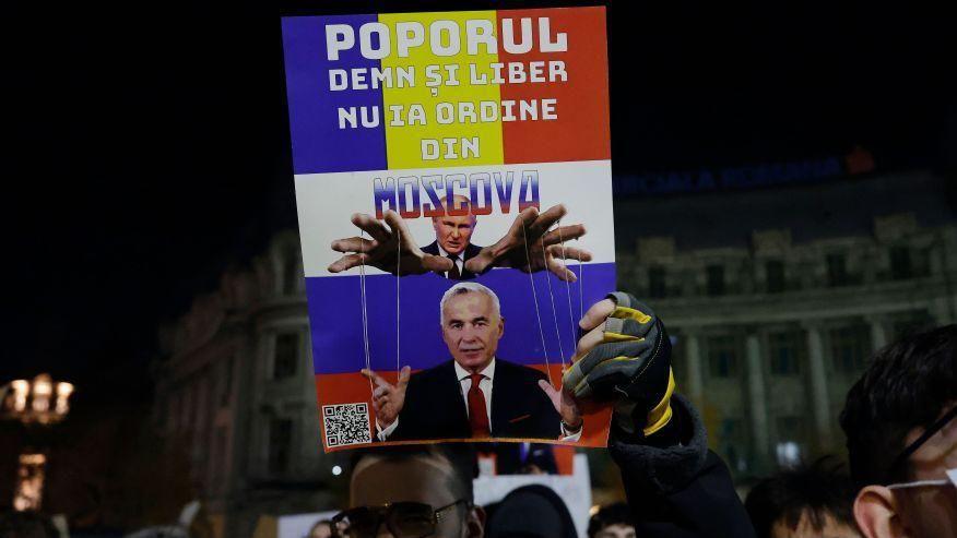 Plakat, na kom je Đorđesku kao marioneta Putina