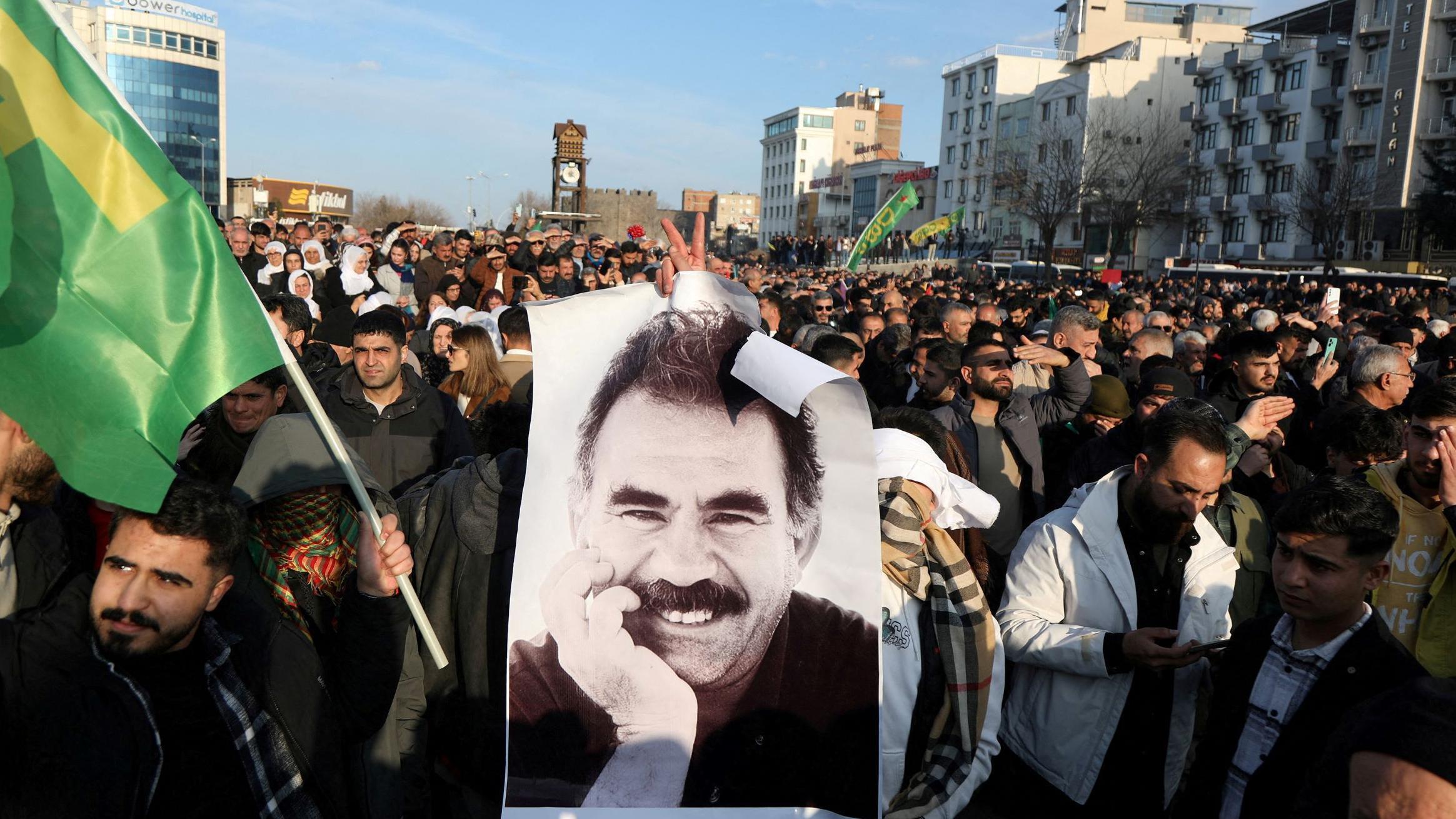 Kurdish group PKK says it is laying down arms and disbanding